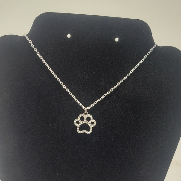 Jewelry - Elegant Silver Tone Paw Print Pendant Necklace